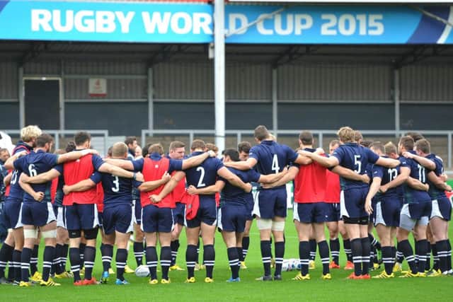 Scotland players form a huddle during the captain's run at Kingsholm yesterday. Picture: Ian Rutherford