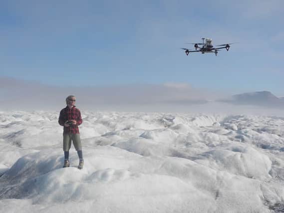 Shane Rodwell with the quadcopter. Picture: SAMS