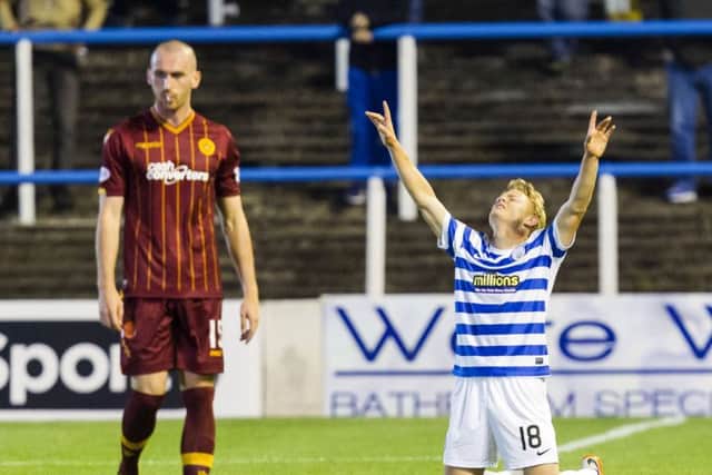 Morton's Alex Samuel (right) celebrates having opened the scoring. Picture: SNS
