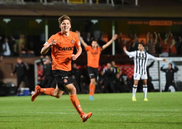 Dundee United's Blair Spittal celebrates having scored his side's second in extra time. Picture: SNS