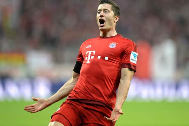 Lewandowski celebrates after netting his third goal - the fastest hat-trick in Bundesliga history. Picture: Getty