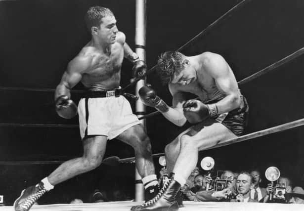 On this day in 1953 Rocky Marciano beat Roland LaStanza by a technical knockout in a world heavyweight title fight. Picture: Getty