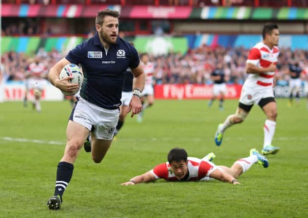 Tommy Seymour of Scotland goes over to score his team's third try. Picture: Getty