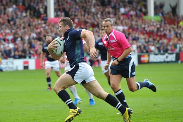 Mark Bennett runs in the first of his two tries against Japan as the Scotland centre produced a stand-out display. Picture: Ian Rutherford