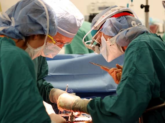 Neurosurgeons made it possible by transmitting signals from the brain to electrodes placed around his knees. Picture: AP