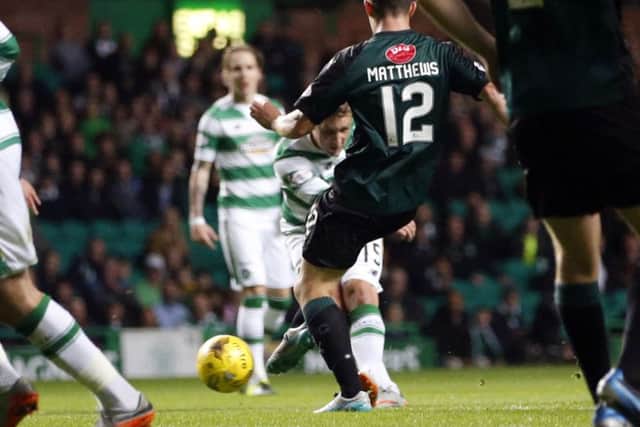 Celtic's Kris Commons gives his side the lead. Picture: PA