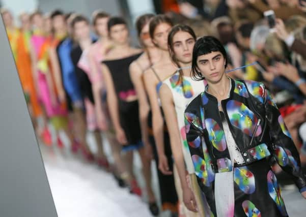 Models wearing outfits during the Christopher Kane Spring/Summer 2016 show for London Fashion Week. Picture: PA
