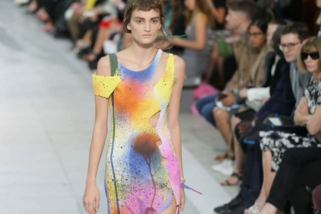A model wears an outfit during the Christopher Kane Spring/Summer 2016 show for London Fashion Week. Picture: PA