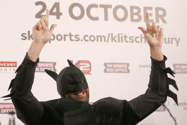British heavyweight Tyson Fury poses in a Batman costume. Picture: AP