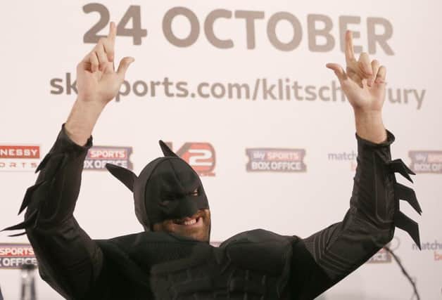 British heavyweight Tyson Fury poses in a Batman costume. Picture: AP