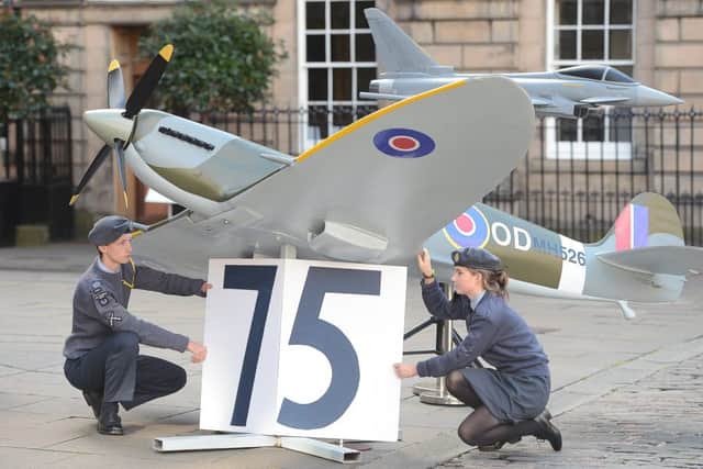 Cadets outside the cathedral with a Spitfire display. Picture: Neil Hanna