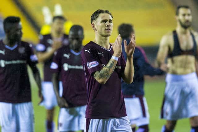 Sam Nicholson acknowledges the travelling fans after Hearts lastgasp win over Kilmarnock. Picture: Sammy Turner/SNS