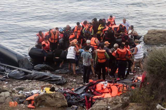 Afghan refugees arrive on the shores of the Greek island of Lesbos. Picture: AFP/Getty