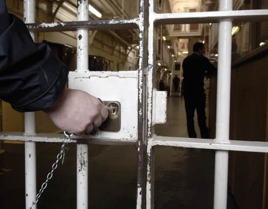 Figures show 60 per cent of those sentenced to less than three months are reconvicted within a year. Picture: Ian Rutherford