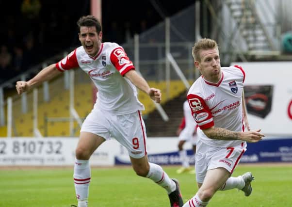 Michael Gardyne celebrates his strike for Ross County. Picture: SNS