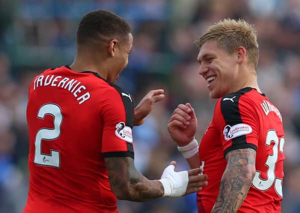 The two goalscorers celebrate after James Tavernier had put Rangers 3-0 up. Picture: Getty