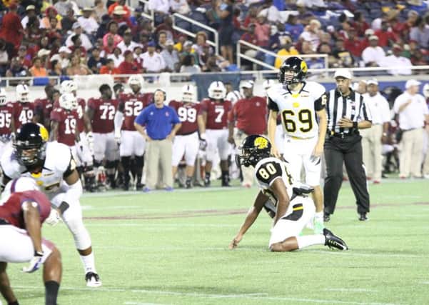 Jamie Gillan (no 69)  in action playing for Arkansas University team the Golden Lions at Pine Bluff. Picture: Contributed