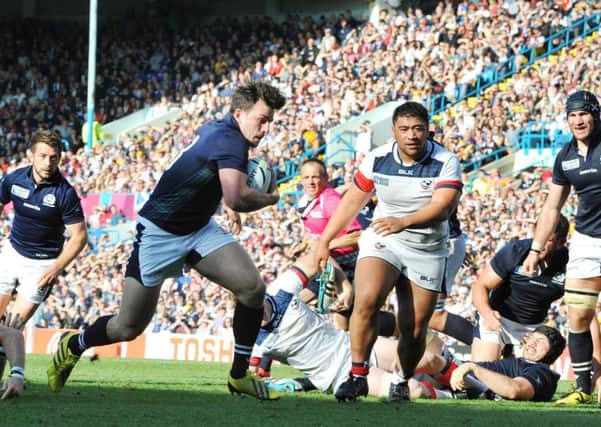 Matt Scott goes over for Scotland's fourth try to secure a bonus point. Picture: Ian Rutherford