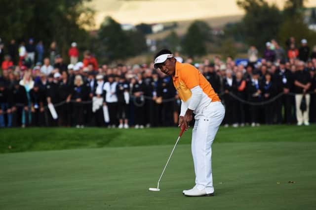 Thongchai Jaidee holes his final putt yesterday to clinch the Porsche European Open in Germany. Picture: Getty Images