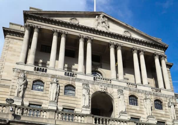 The Bank of England may have to keep interest rates on hold until the middle of 2016. Picture: PA