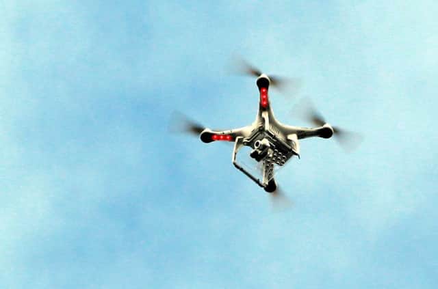 The use of drones could be tightened following a number of near misses with aircraft close to major British airports. Picture: PA