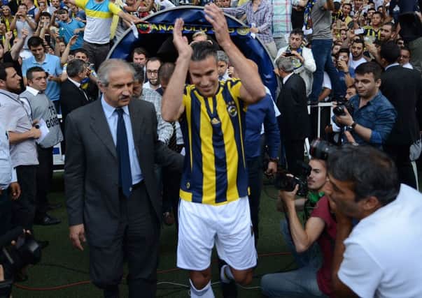 Robin Van Persie was welcomed with open arms when he signed for Fenerbahce in the summer but has been left out of the starting line-up in recent weeks. Picture: AFP/Getty