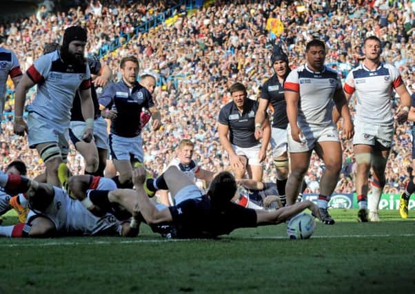 Matt Scott reaches out to score his try. Picture: Jane Barlow