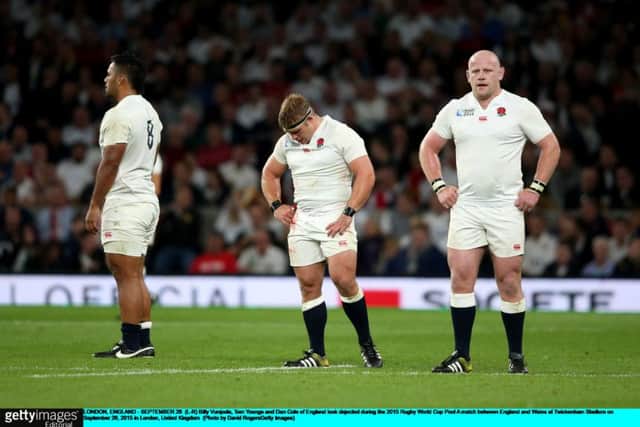 England players, from left, Billy Vunipola, Tom Youngs and Dan Cole are dejected following their defeat by Wales at Twickenham. Picture: Getty Images