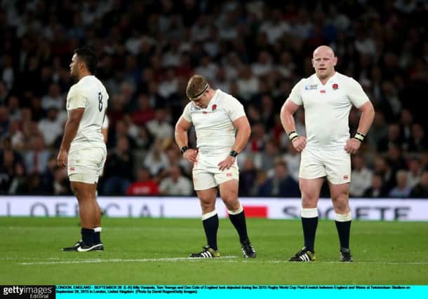 England players, from left, Billy Vunipola, Tom Youngs and Dan Cole are dejected following their defeat by Wales at Twickenham. Picture: Getty Images