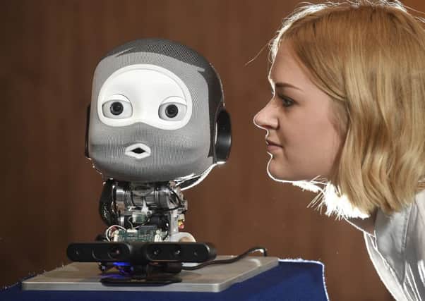 The iCub is a talking humanoid robot head with the ability to see, speak and hear Picture: Greg Macvean