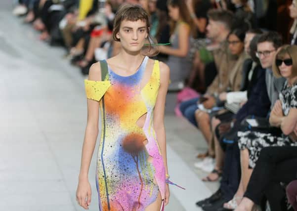 A model wears a Christopher Kane Spring/Summer 2016 outfit show for London Fashion Week in the Sky Garden. Picture: PA