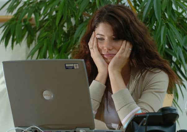 A woman, pondering a question on Yahoo! Answers, perhaps. Picture: Ian Rutherford