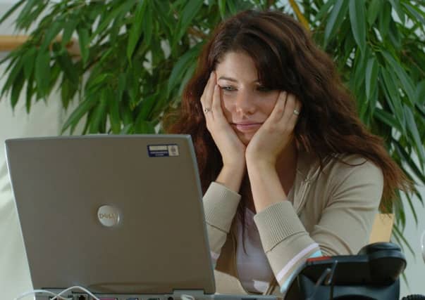 A woman, pondering a question on Yahoo! Answers, perhaps. Picture: Ian Rutherford
