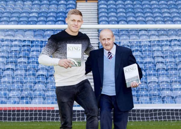Rangers striker Martyn Waghorn, left, joins club legend Johnny Hubbard at Ibrox to help launch the former player's autobiography. Picture: SNS