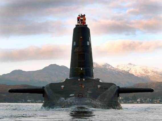 HMS Victorious, one of the Royal Navy's four strategic missile submarines, departs Faslane. Picture: PA