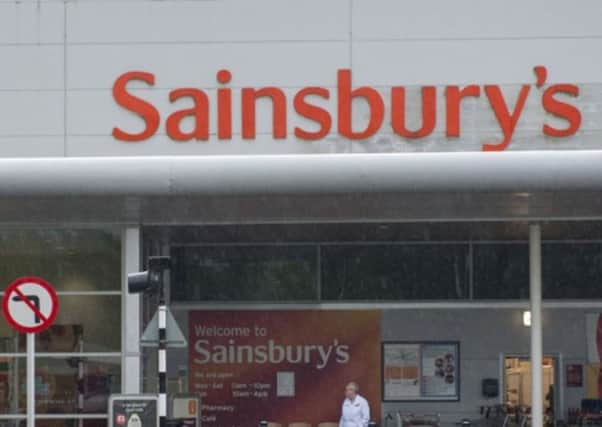 Sainsbury's said annual profits should beat City hopes