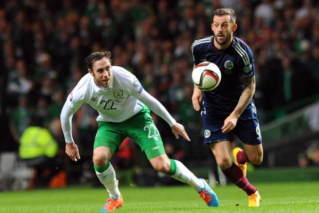 Steven Fletcher battles with Richard Keogh of Ireland. Picture: Lisa Ferguson