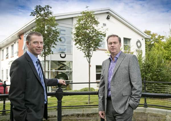 Ian Grant (left), relationship manager at Clydesdale Bank and Stephen Burt, managing director of Motion Software. Picture: Contributed