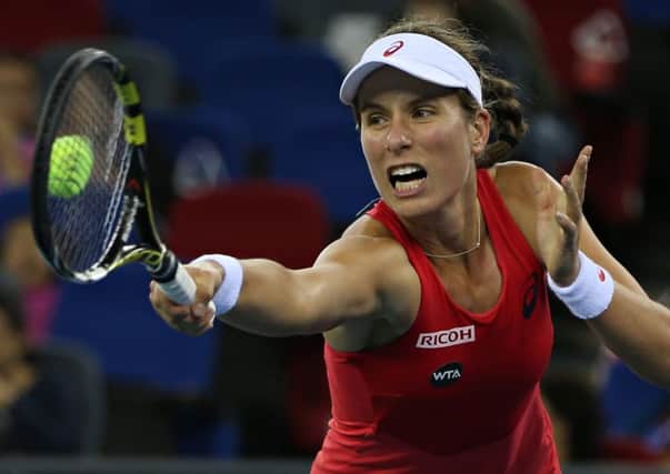 Johanna Konta returns to Venus Williams during their quarter-final clash. Picture: Getty Images