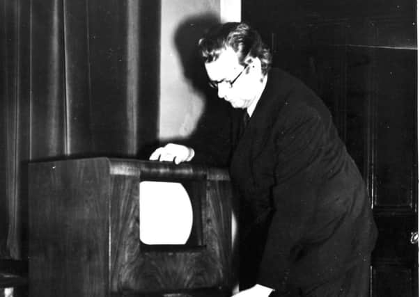 Scottish inventor of television John Logie Baird with an early TV set - pic not dated.  Possibly taken in the 1930's