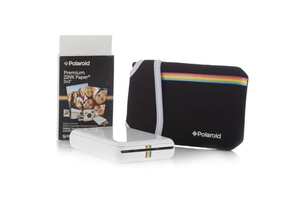 Polaroid ZIP Instant Mobile Photoprinter with 50 Zinc Paper Pack & Case, available from qvcuk.com. Picture: PA