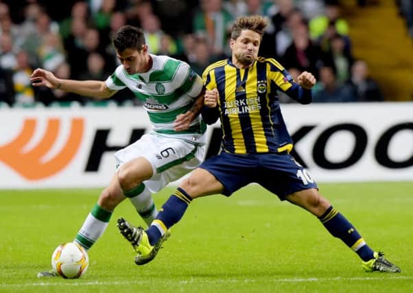 Nir Bitton (left) battles with Fenerbahce's Diego. Picture: SNS Group