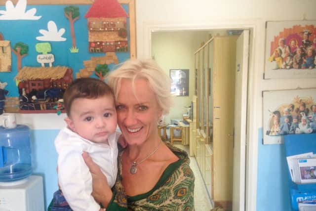 Laura Tenison at the orphanage. Picture: JoJo Mamam Bebe