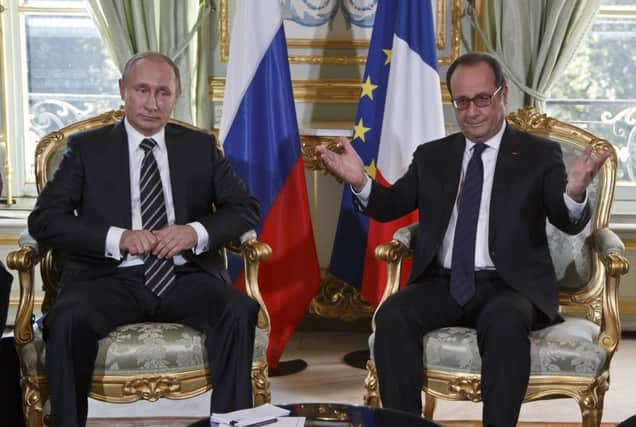 Putin and Hollande were supposed to discuss Ukraine, not IS. Picture: Getty