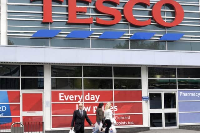 Tesco's half-year profits are forecast to have fallen heavily