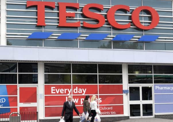 Tesco's half-year profits are forecast to have fallen heavily