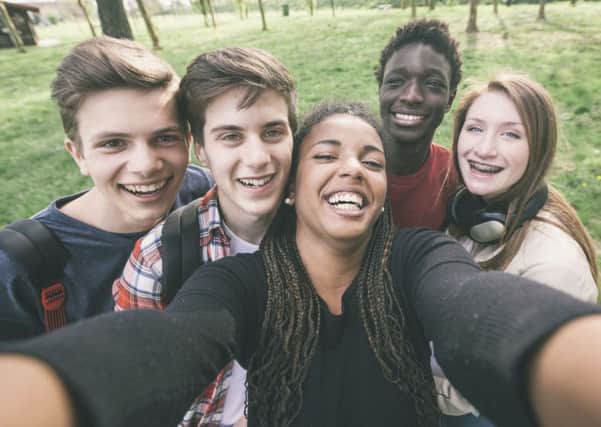Some teenagers may appear outwardly confident, but many might need a self-esteem boost. Picture: PA