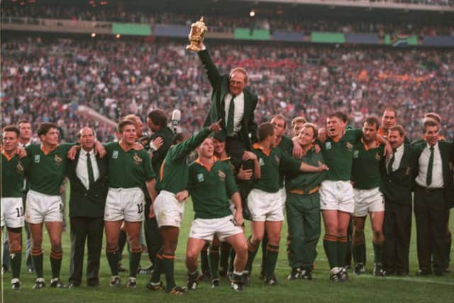 South Africa coach Kitch Christie is paraded shoulder-high by his jubilant team after they famously defeated New Zealand in the 1995 World Cup final at Ellis Park. Picture: Getty