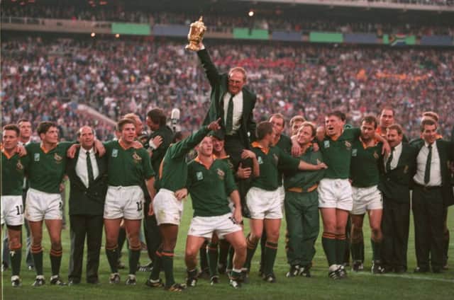 South Africa coach Kitch Christie is paraded shoulder-high by his jubilant team after they famously defeated New Zealand in the 1995 World Cup final at Ellis Park. Picture: Getty