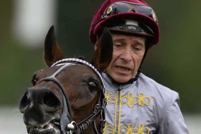 Thierry Jarnet after riding Treve to a second Arc victory at Longchamps last year. Picture: Getty